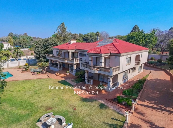  Charming 7 Bedroom Double Storey Home with a 5 Bedroom Cottage on 1 Acre