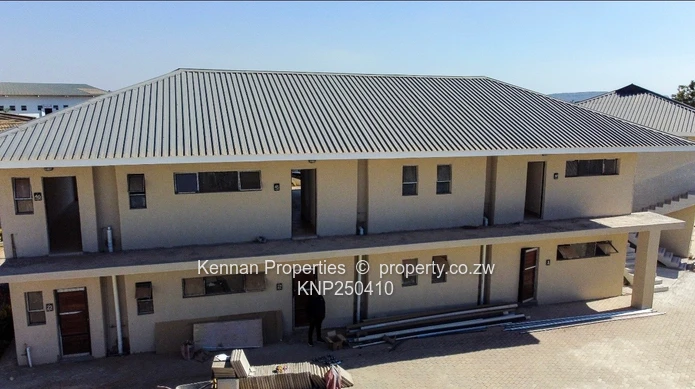 Apartment units in a two storey block of flats for sale in Ashdown Park.