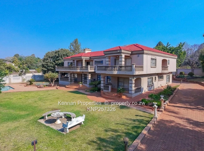  Charming 7 Bedroom Double Storey Home with a 5 Bedroom Cottage on 1 Acre