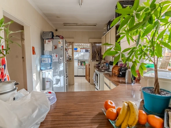 Charming corner unit in safe and secure complex