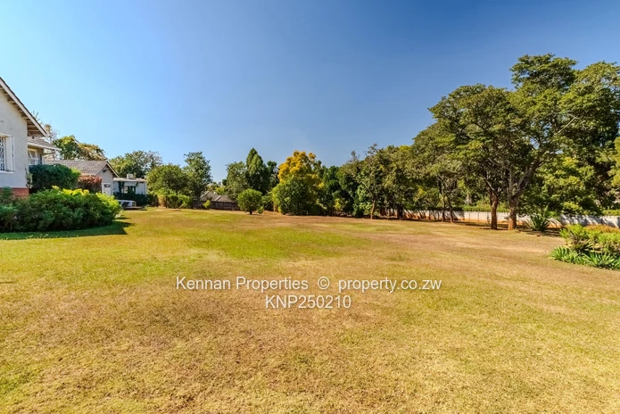 Attractive five bedroom home on two and a half acres. Good water and Msasa trees. (Sole Mandate)