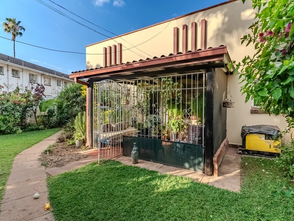 Charming corner unit in safe and secure complex