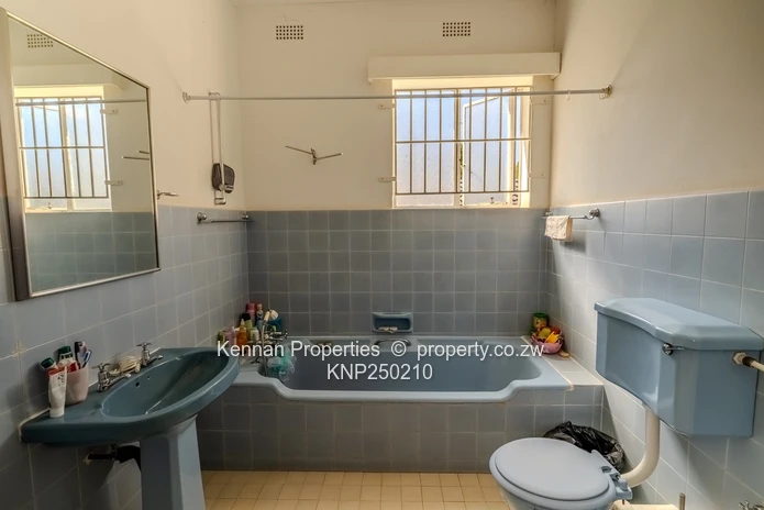 Attractive five bedroom home on two and a half acres. Good water and Msasa trees. (Sole Mandate)