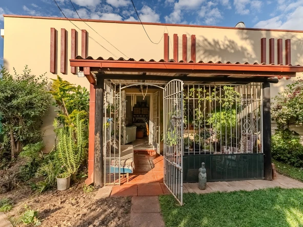 Charming corner unit in safe and secure complex