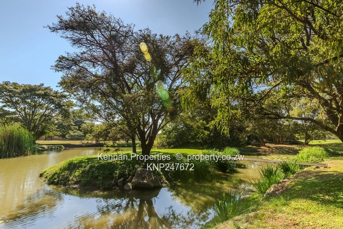 On 1 Acre Overlooking dam and Third Green in this Elite Golf Estate  (Sole Mandate)