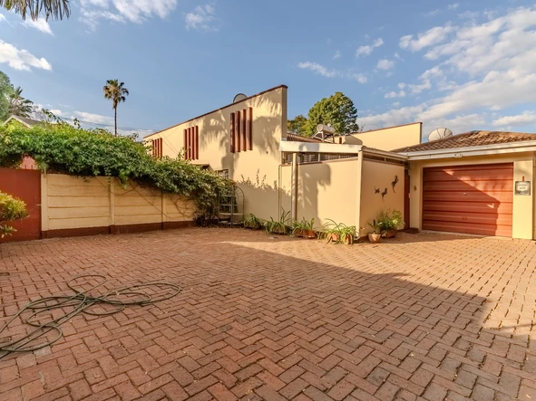 Charming corner unit in safe and secure complex