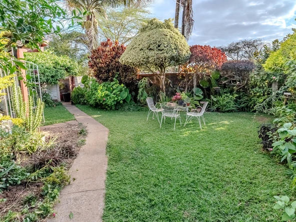 Charming corner unit in safe and secure complex