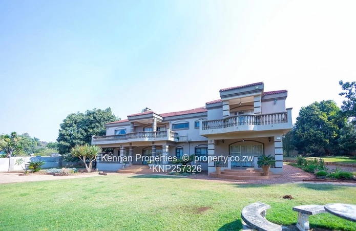  Charming 7 Bedroom Double Storey Home with a 5 Bedroom Cottage on 1 Acre