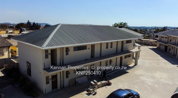 Apartment units in a two storey block of flats for sale in Ashdown Park.
