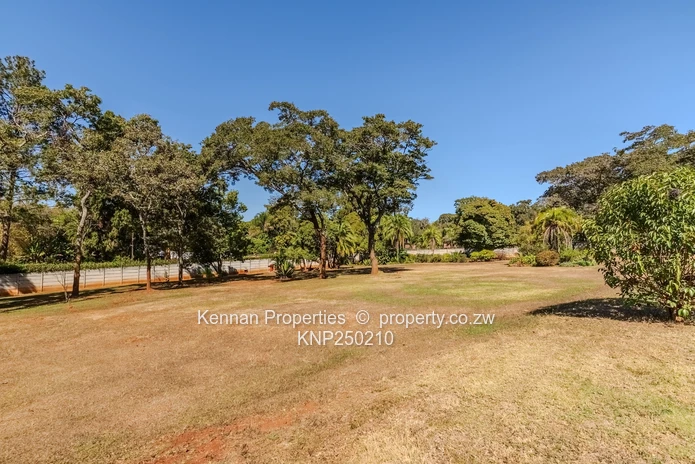 Attractive five bedroom home on two and a half acres. Good water and Msasa trees. (Sole Mandate)