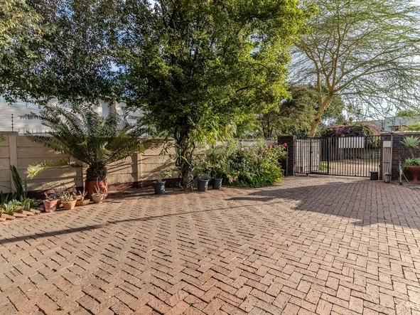 Charming corner unit in safe and secure complex