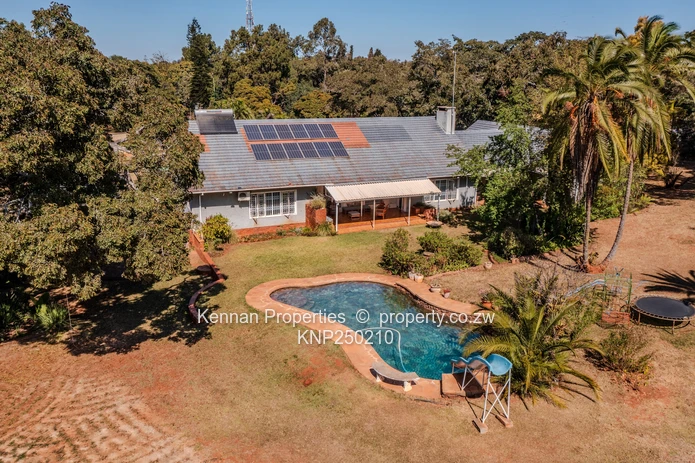 Attractive 5 bedroom home on two and a half acres. Great location and good water. (Sole Mandate)